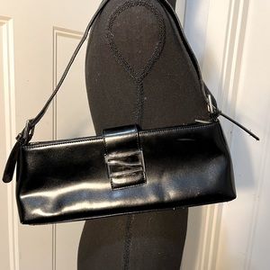 Black satchel. Measures 13x5x3.